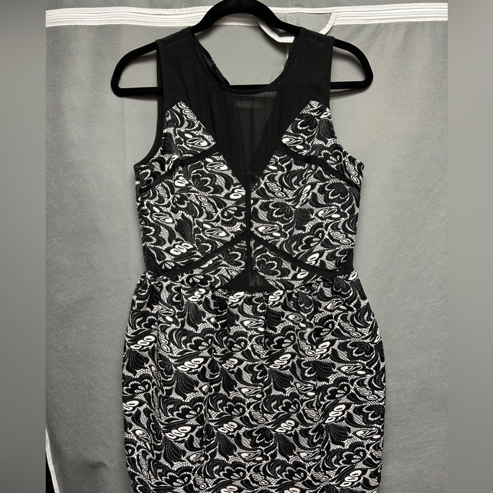 Never worn - original tags; Black and white floral print dress with zip-up back